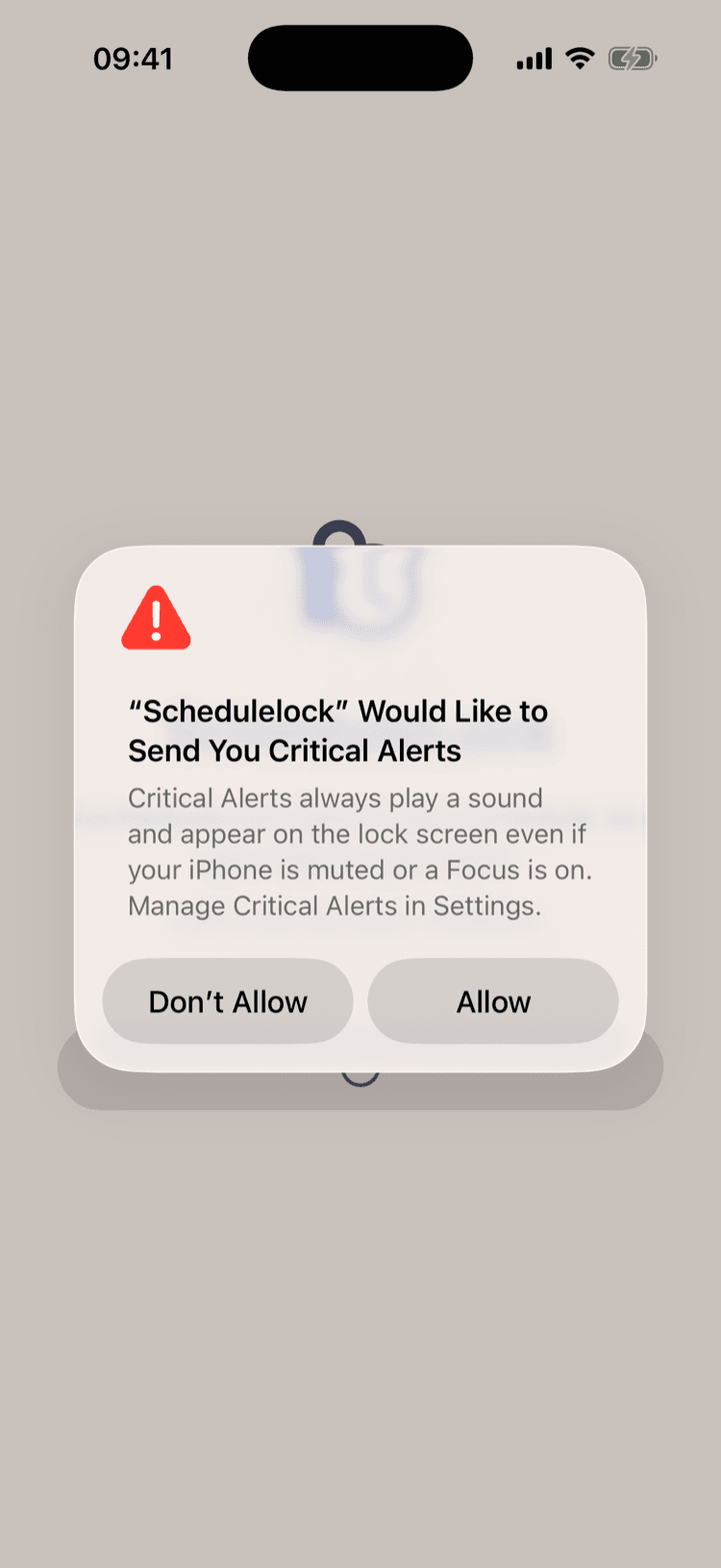 The iOS Critical Alerts permission prompt, explaining that critical alerts always play a sound and appear on the lock screen even if the iPhone is muted or a Focus is on, with Don't Allow and Allow buttons.