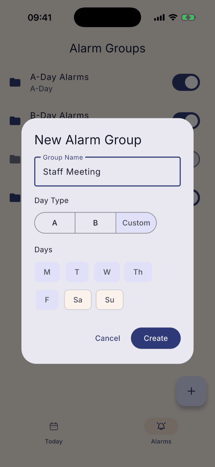 The New Alarm Group dialog with the name Staff Meeting, Day Type set to Custom, and a Days row of M T W Th F Sa Su chips with Monday to Friday selected.